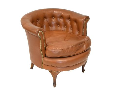 Early 20th Century button back tub chair upholstered in tan hide  