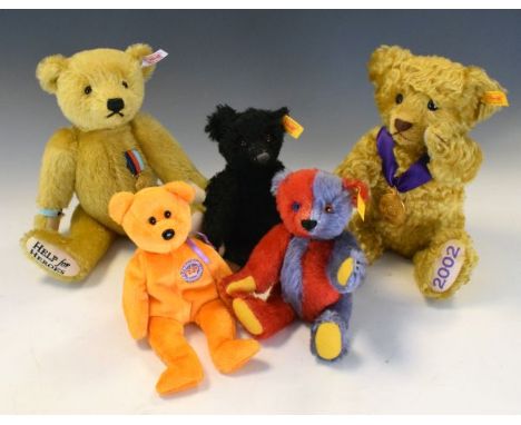 Group of four Steiff bears comprising: 663598 Help For Heroes Bear with certificate, 6215 The Golden Jubilee Bear, with certi