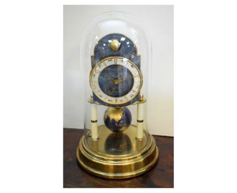 Unusual mid 20th Century anniversary or torsion mantel clock, Kaiser Germany, the Arabic chapter ring with Zodiac signs, brea