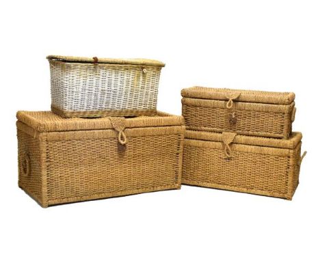 Graduated set of three woven seagrass trunks, largest 85cm wide x 44cm deep x 44cm high, together with a smaller wicker hampe