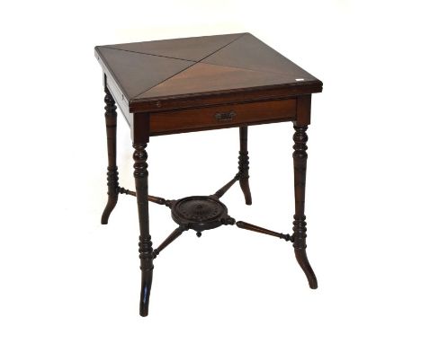 Victorian walnut envelope top card table, fitted one drawer, raised on slender turned outswept supports united by a cross str