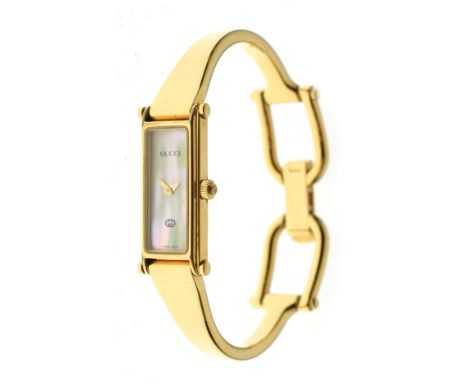 Gucci - Lady's fashion watch with mother-of-pearl rectangular dial, to a gold-plated bangle strap in branded presentation box