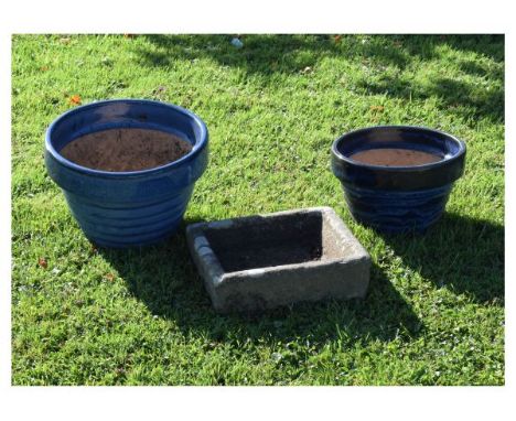 Two blue-glazed pottery garden pots, largest 36cm diameter x 26cm high, together with a reconstituted bird bath of rectangula