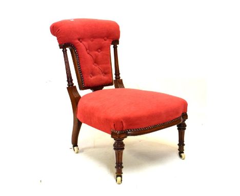 Victorian walnut framed nursing chair having button back upholstery  