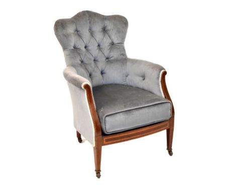 Edwardian mahogany and satinwood crossbanded armchair, raised on square tapered supports, upholstered in blue button fabric  