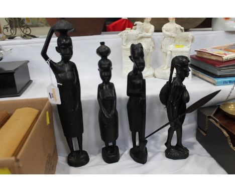 4 African carved figures 