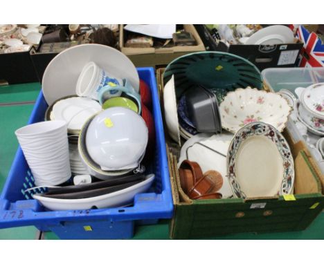 Two boxes of decorative plates, bowls and alarm clock 