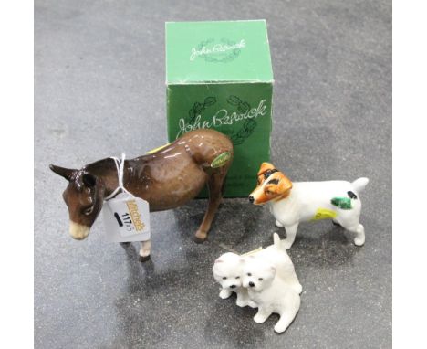 Three Beswick ornaments, donkey, Jack Russell and pair of Terriers