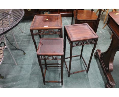 Nest of oriental hardwood occasional tables/plant stands.  Tallest 68 cm x 34 cm, smallest 57 cm x 25 cm