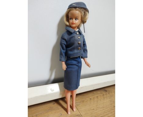 A vintage air hostess doll