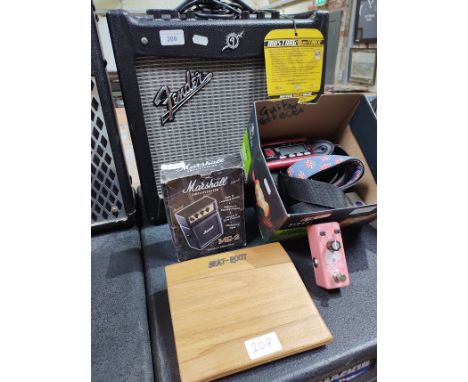 A Fender Mustang V2 amplifier and a box of accessories including Marshall micro amp, pedals, tuners, etc.  