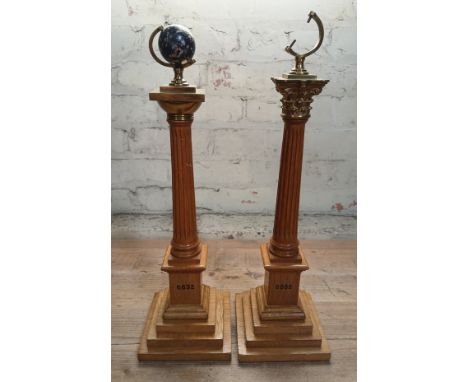 A pair of Masonic light oak and brass mounted corinthian columns with terrestrial globes to top (one missing), lodge number 6