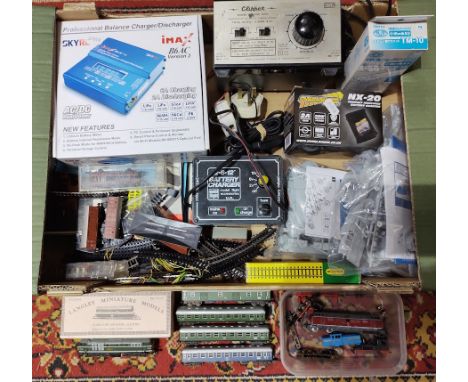 A group of model train items to include n gage, ho models &amp; battery chargers etc.  