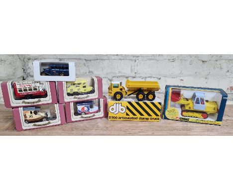 A tray of assorted model vehicles to include an NZG No. 166 DJB D300 articulated dump truck, a Corgi 1110 JCB 110B crawler lo