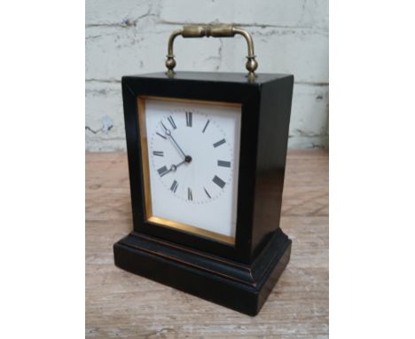 A French WWI officer's alarm carriage clock, ebonised case, with key.  