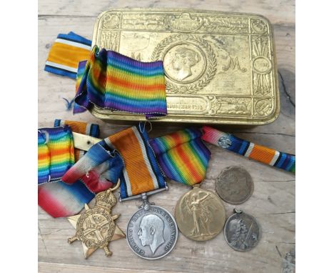 A WWI Christmas tin and a WWI group of three awarded to 26567 PTE P YEOMANS E YORK R  