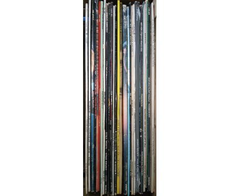 A box of approximately 30 blues LPs including John Mayall, Roy Buchanan, Buddy Guy, Peter Green, JJ Cale, The Moody Blues, Bo
