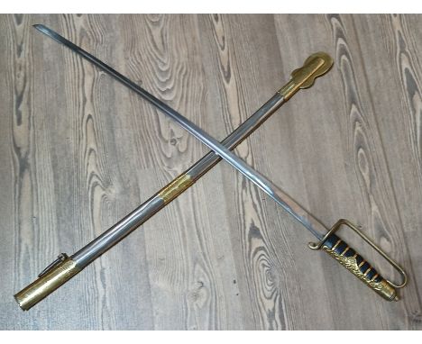 A reproduction sword and scabbard.  