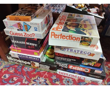 A collection of 12 vintage board games comprising Horror House, Stratego, Escape From Colditz, Diplomacy, Hotez, Perfection, 
