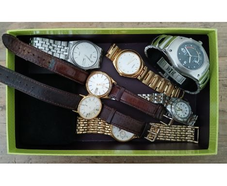 A box of mainly Seiko wristwatches including a Seiko Kinetic  Condition - the Kinetic winds, ticks and advances, not sure ent