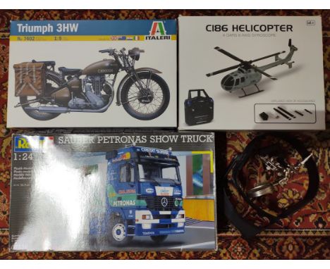 A box containg 2 unbuilt model kits (Italeri Triumph 3HW no.7402 1:9 &amp; Revell Sauber Petronas show truck 07536 1:24), a b