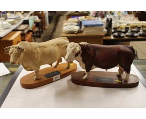 A Connoisseur model by Beswick of a Hereford Bull and another of a Charolais Bull