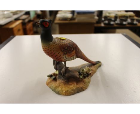 A Royal Crown Derby model of a pheasant 