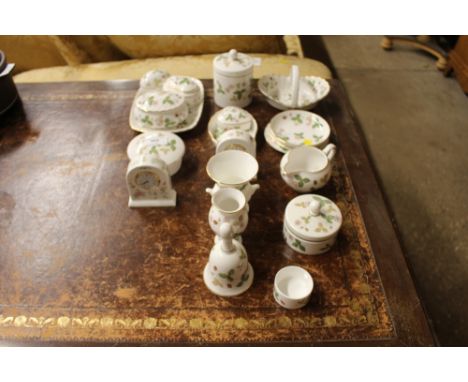 A collection of Wedgwood "Wild Strawberry" china, to include trinket boxes, vases, hand bell etc. 