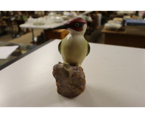 A Royal Worcester model of a woodpecker