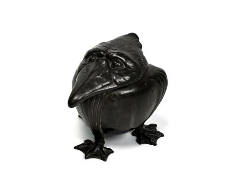 An Art Nouveau pewter 'grotesque bird' inkwell, with green pottery underbody on three webbed feet, probably by Kayserzinn, 10