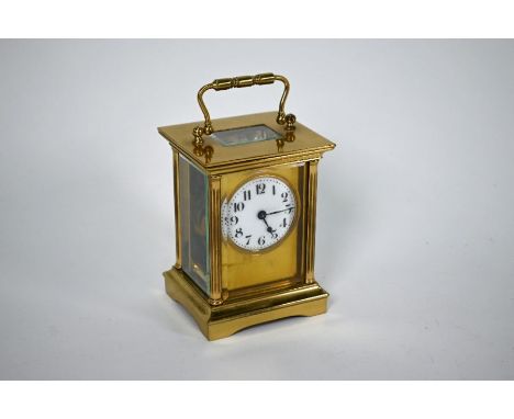 Duverdrey &amp; Bloquet, a brass single train 8-day carriage clock, the white enamel dial within a plain brass mask, 12 cm h 