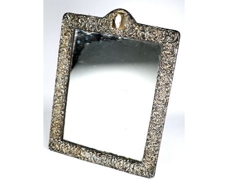 A large Edwardian silver-faced easel mirror with foliate-embossed decoration, Cohen &amp; Charles, Birmingham 1903, 43 x 32cm