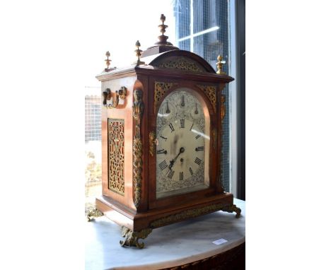 A large late 19th century Georgian style ormolu mounted walnut cased triple fusee musical table clock, striking the quarter h