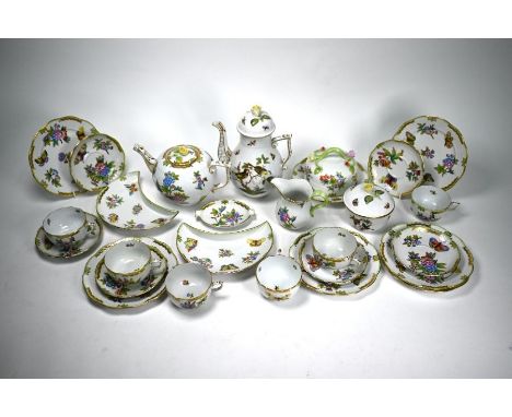 A Herend Queen Victoria pattern tea/coffee service, comprising teapot and coffee pot, six cups and saucers, milk jug, sugar b