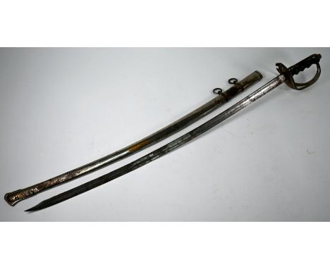 An Italian cavalry sabre, the 84cm engraved blade with shaped point by G Cesati &amp; Fi Milan-Roma, plated basket hilt and s