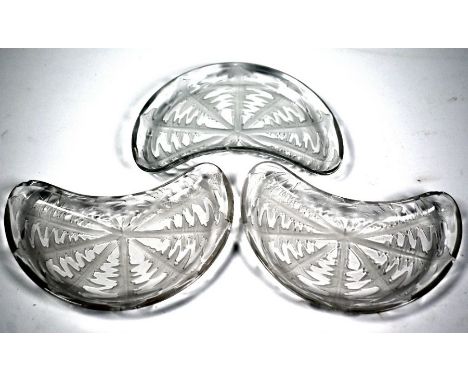 Three Lalique 'Pissenlit' (Dandelion) crescent dishes, impressed 'R LALIQUE', 14 x 20.5 cm - all chipped