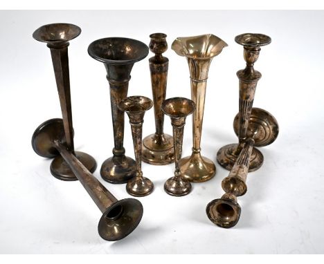 A pair of US Sterling loaded baluster candlesticks, 20cm high, to/w a single Sterling candlestick and six silver vase-flutes 