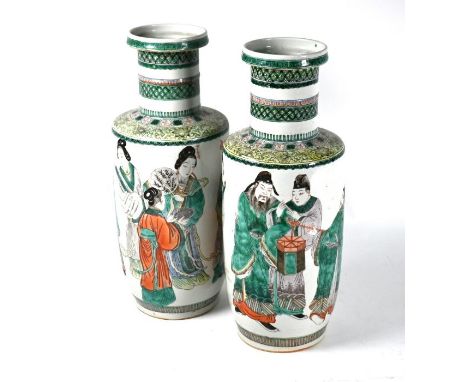 A pair of Chinese 19th century famille verte rouleau vases in the Kangxi style, painted with a mirrored design of the eight D