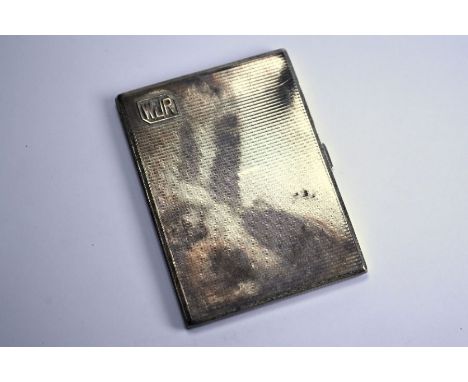 An Art Deco silver&nbsp;cigarette case with engine-turned decoration inside and out and mounted with initials WJR, Cohen &amp