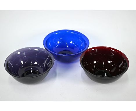 Three Chinese monochrome Peking glass bowls, probably 19th century, light aubergine, dark aubergine and blue, all approx 16 c