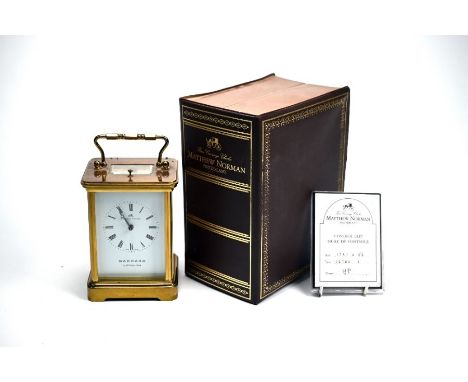 Matthew Norman Clocks, a Garrard of London retailed lacquered brass carriage clock, the two train movement No.1752 with hour 