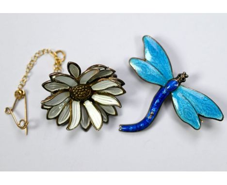 David Andersen, Norway - a brooch in the form of a stylised daisy with white enamel leaves, stamped Sterling 925S to/w a blue