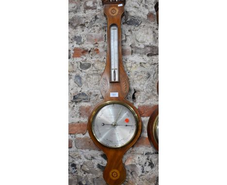 Hardcastle, London, a Victorian mahogany boxwood shell design inlaid barometer, with silvered dial and thermometer, 95 cm h