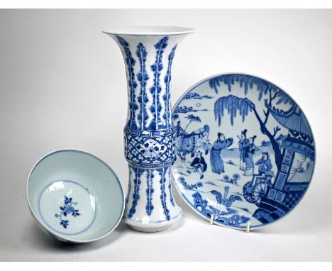 An 18th century Chinese blue and white bowl painted in underglaze blue with branches of fruiting peach and pomegranate, the b