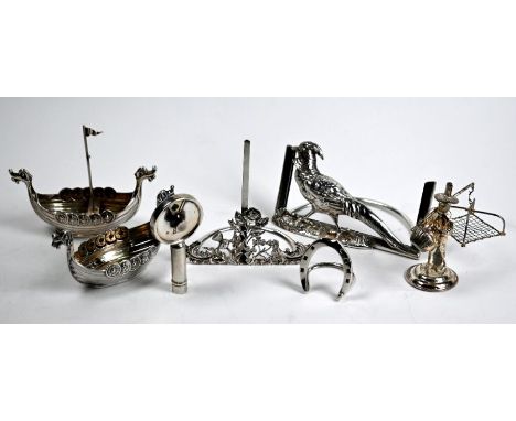 An Edwardian silver menu holder modelled with a golden pheasant, Grey &amp; Co, Birmingham 1907, another cast with rose, this