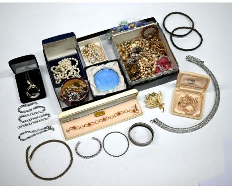 Mixed costume jewellery items including row of cultured pearls, modern fashion jewellery, beads, bangle, and a circular blue 