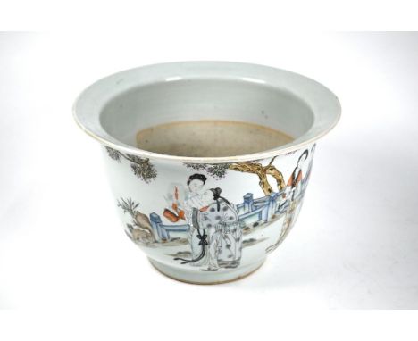 A 19th century Chinese famille rose jardiniere, painted in polychrome enamels with elegant ladies at leisure in a fenced gard