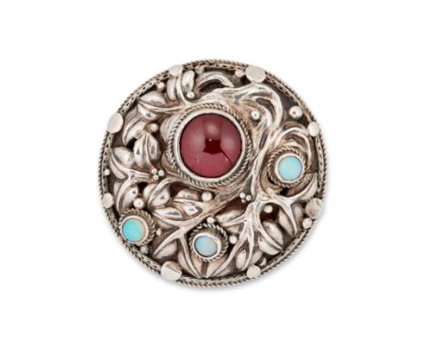 An Arts &amp; Crafts silver garnet and opal brooch, possibly the Artificer's Guild, of circular form with collet set cabochon