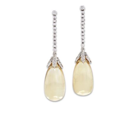 A pair of citrine and diamond drop earrings, an articulated brilliant-cut diamond line, suspending carved citrine pippin drop