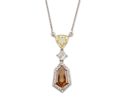 A diamond and coloured diamond pendant, with a hexagonal step cut fancy brown diamond within brilliant cut diamond surround, 